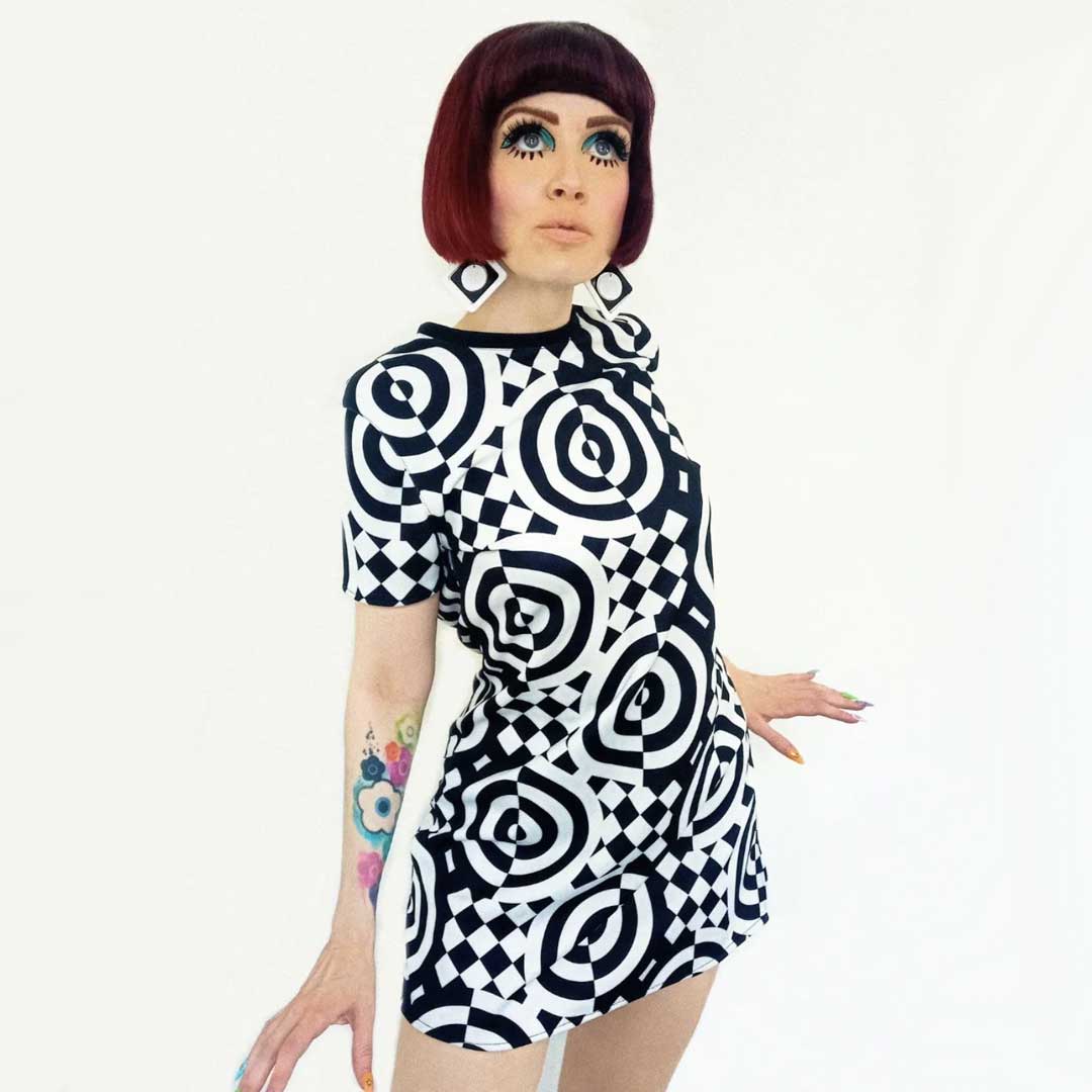 Model wearing Op art textile design